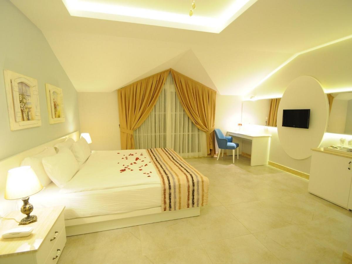 Sea Breeze Hotel And Apartments Олудениз Стая снимка